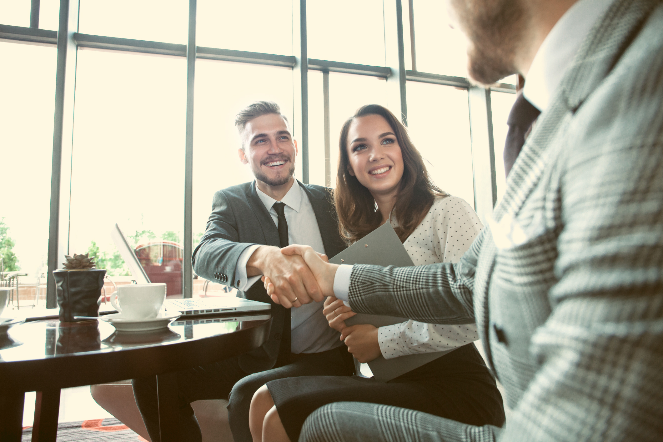 Business people shaking hands